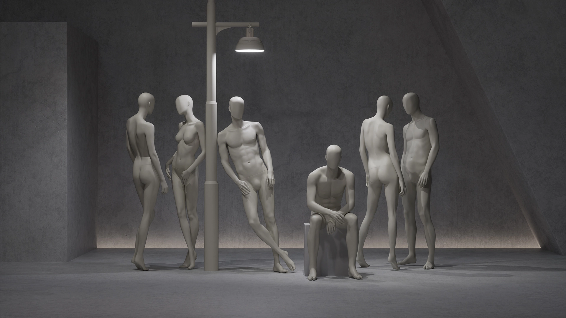 a group of female and male mannequins from the blend collection sitting, standing and leaning against a lightpole in a concrete environment