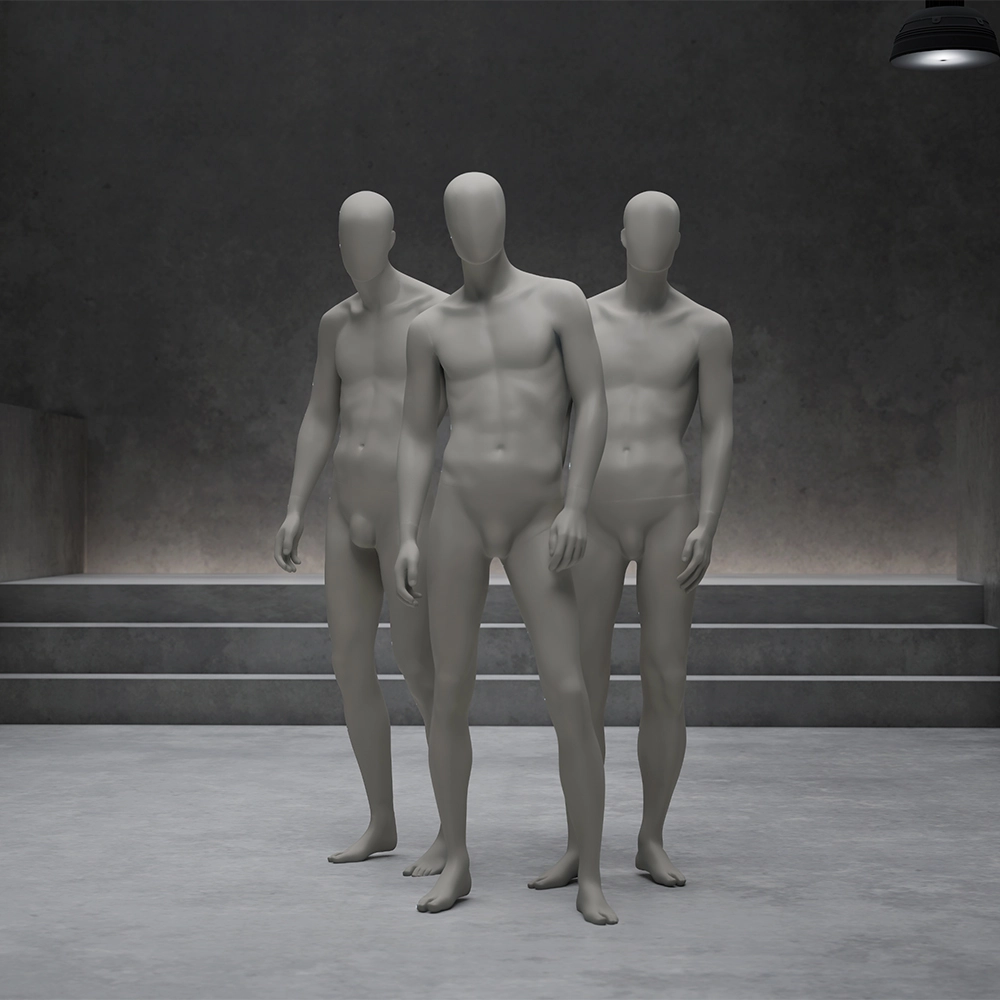 a group of three male mannequins from the casual collection standing on a stair of concrete