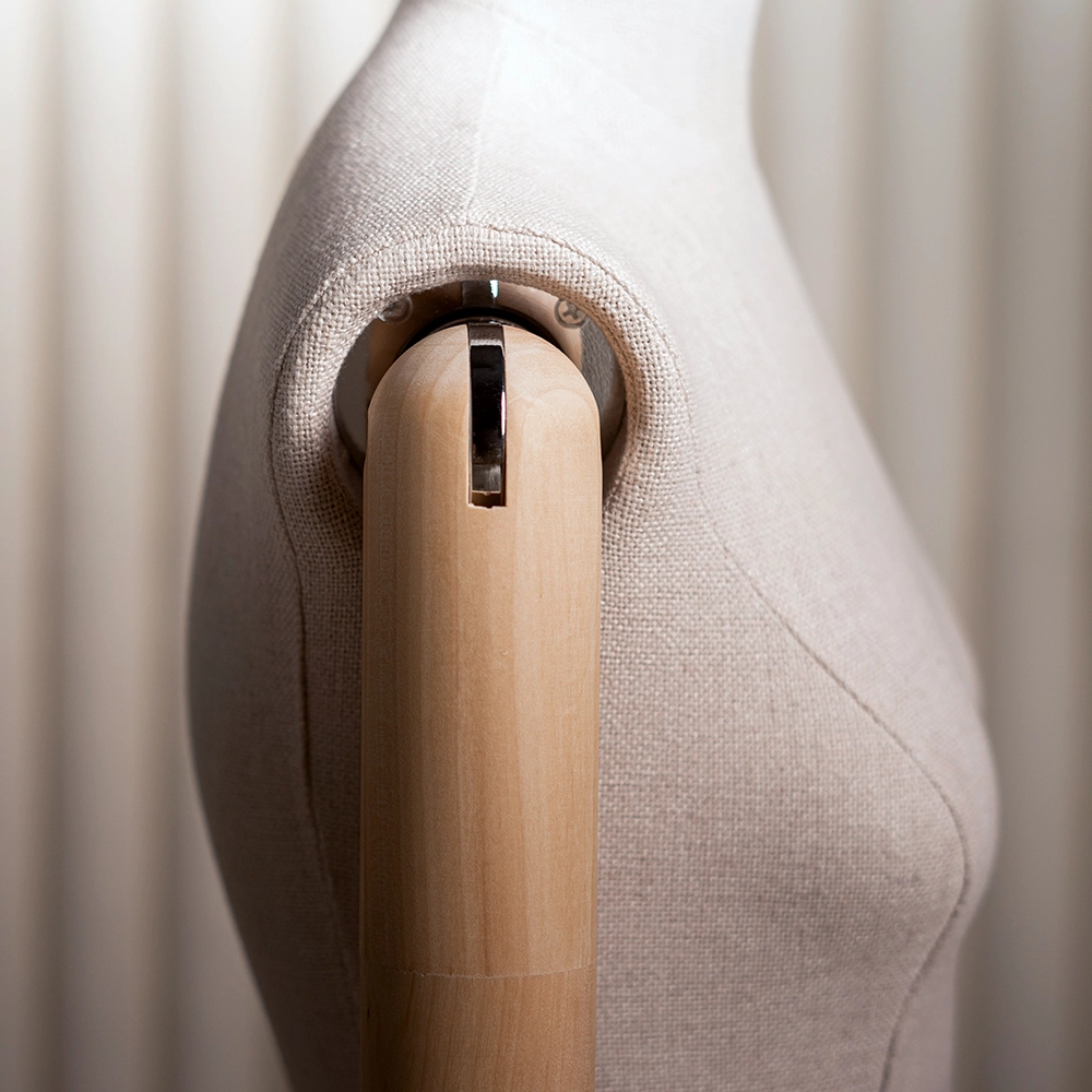a closeup of the shoulder of the female fabric mannequin from the essential collection