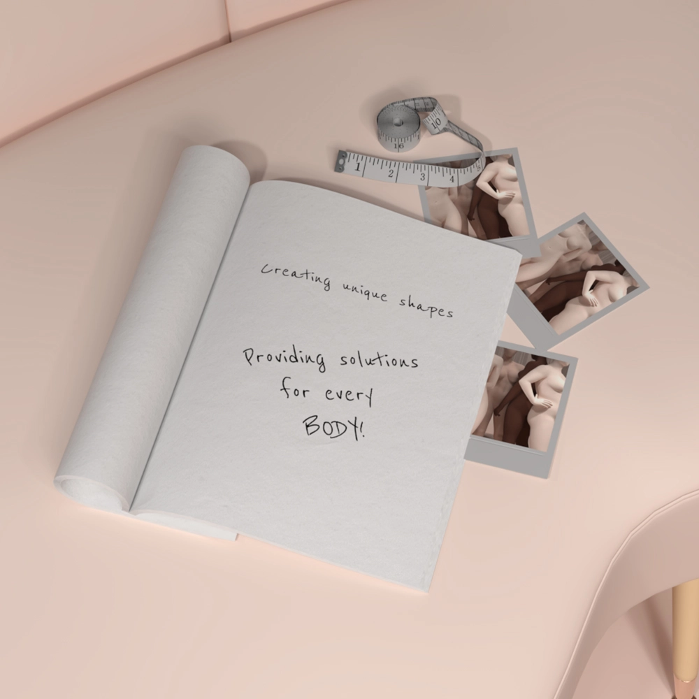 A booklet lying on a couch with polaroids spread around it