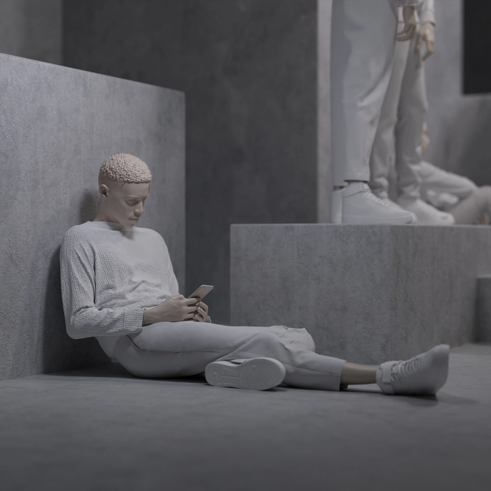 realistic dressed male mannequin sitting on the floor and holding a phone from the untitled collection
